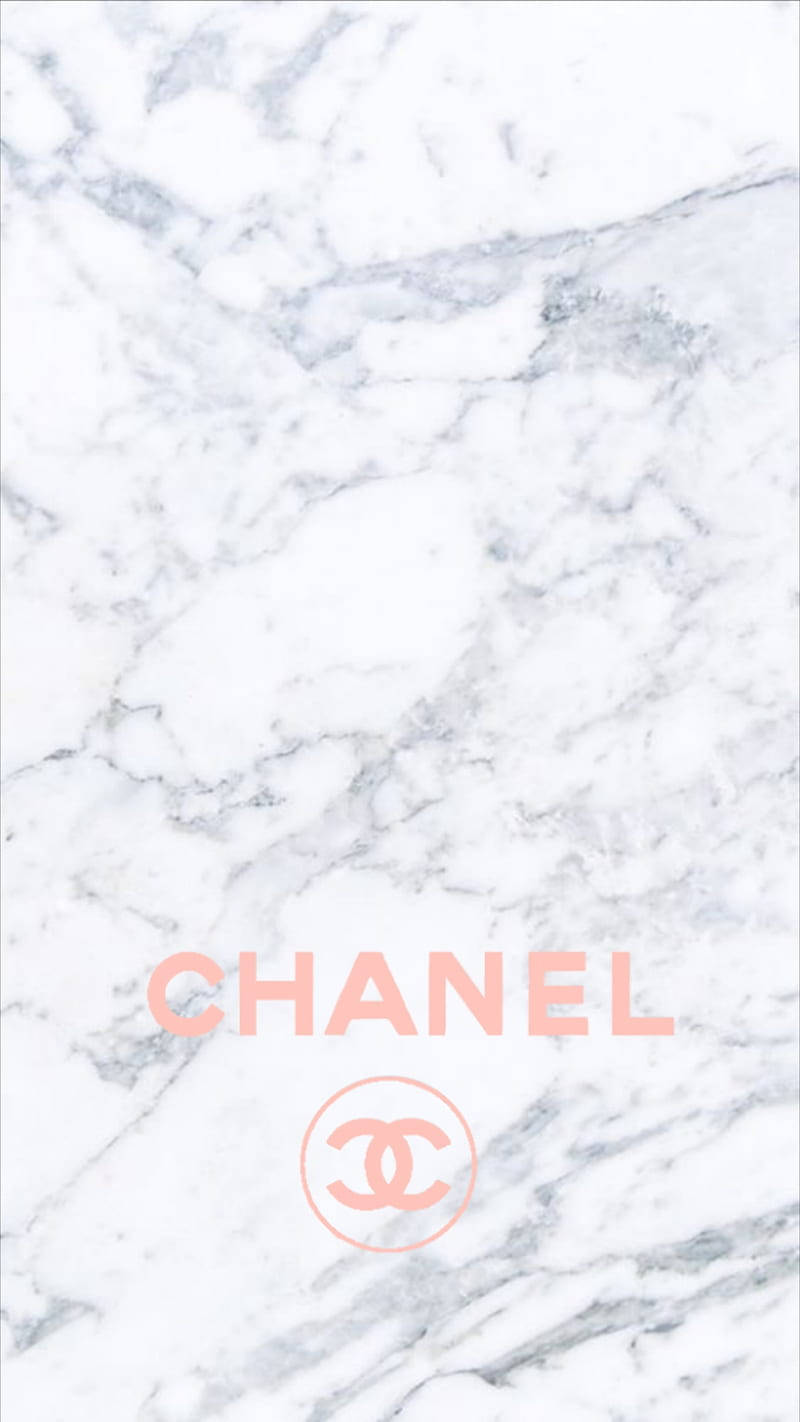 Den ikoniske pink Chanel logo står mod et baggrundslys af fine sorte og hvide polka prikker. Wallpaper