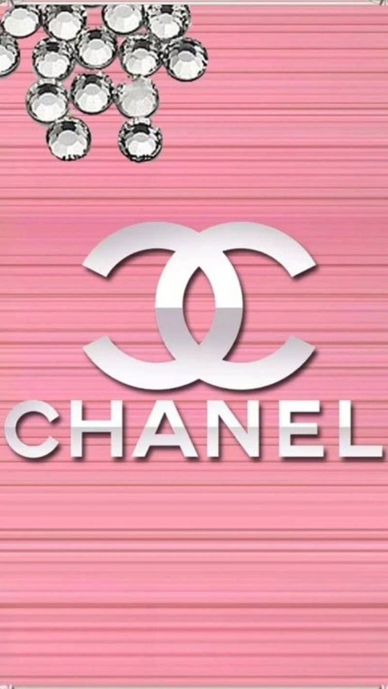 Silver Beads Above Pink Chanel Logo Wallpaper