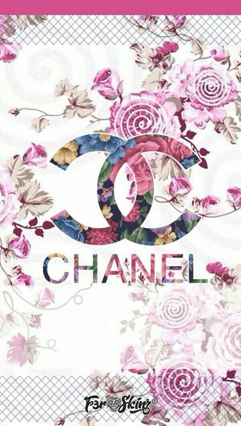 A pink-colored logo of the luxurious fashion brand, Chanel. Wallpaper