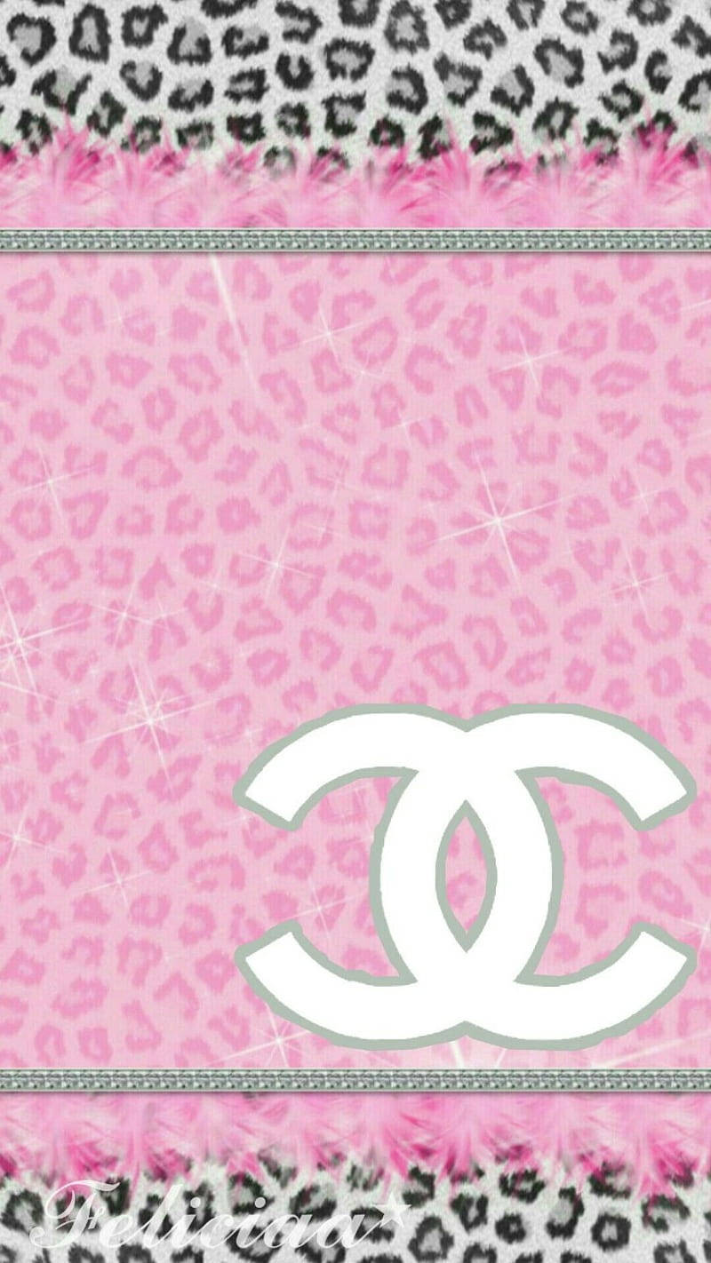 Den feminine og elegante Pink Chanel Logo Wallpaper