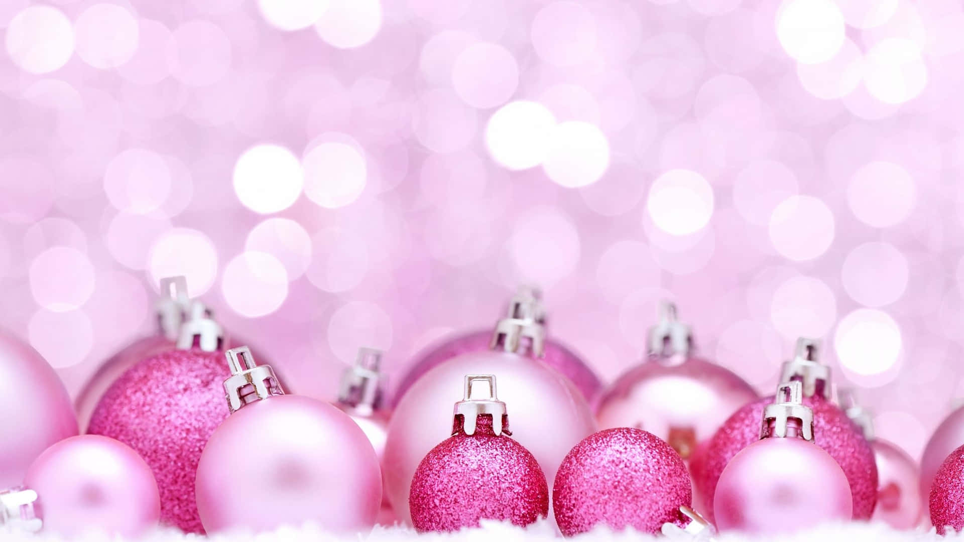 Pink Christmas Ornaments On A White Background