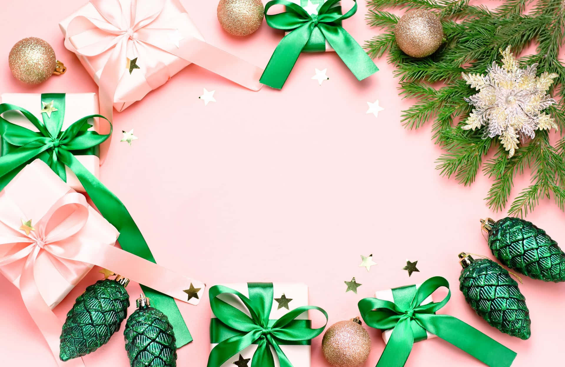 Christmas Presents On Pink Background With Green Ribbons