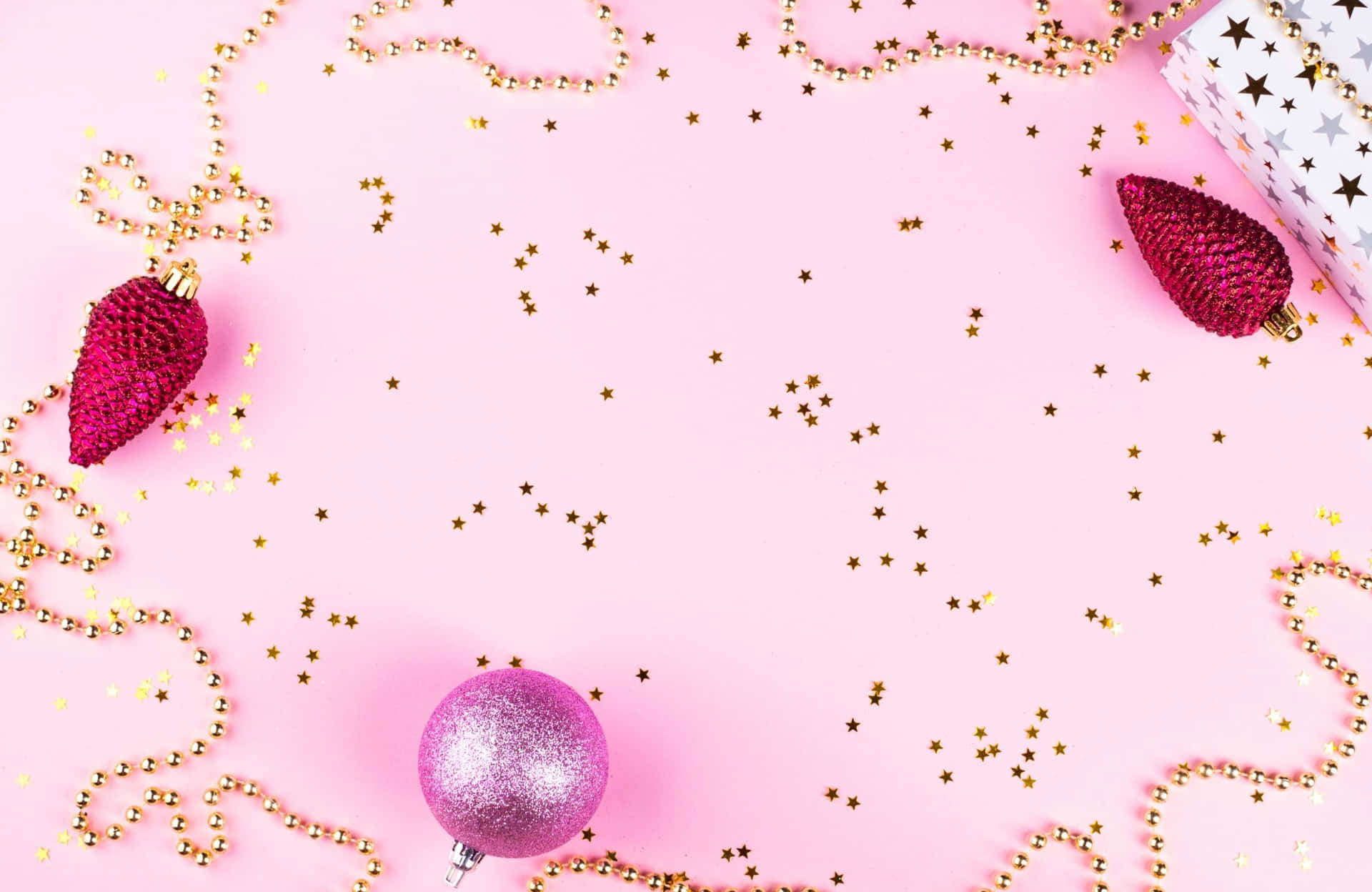 Enjoy the festive spirit of the Holiday season with this beautiful pink Christmas background