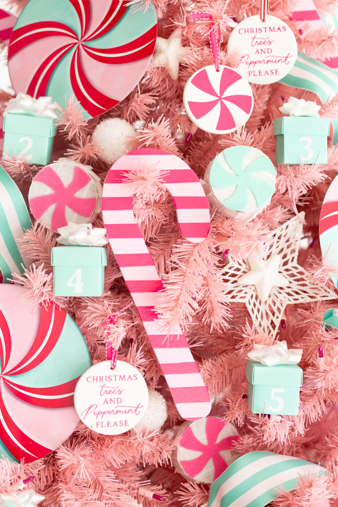 Celebrate the holidays in a festive and fun way with this charming Pink Christmas Tree. Wallpaper