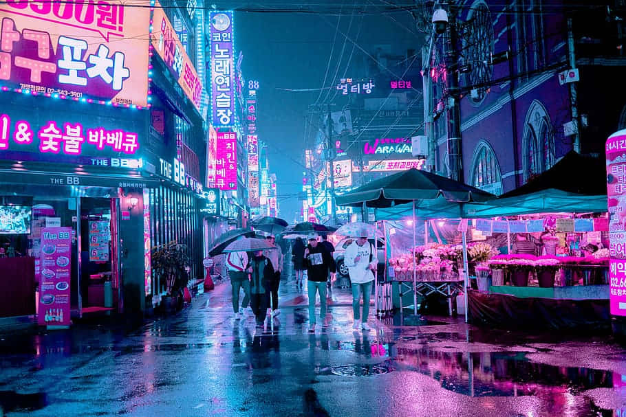 En Gade Med Neon-lys Wallpaper