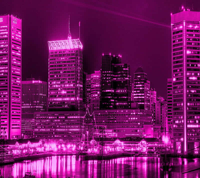 A City Skyline Lit Up In Pink Wallpaper