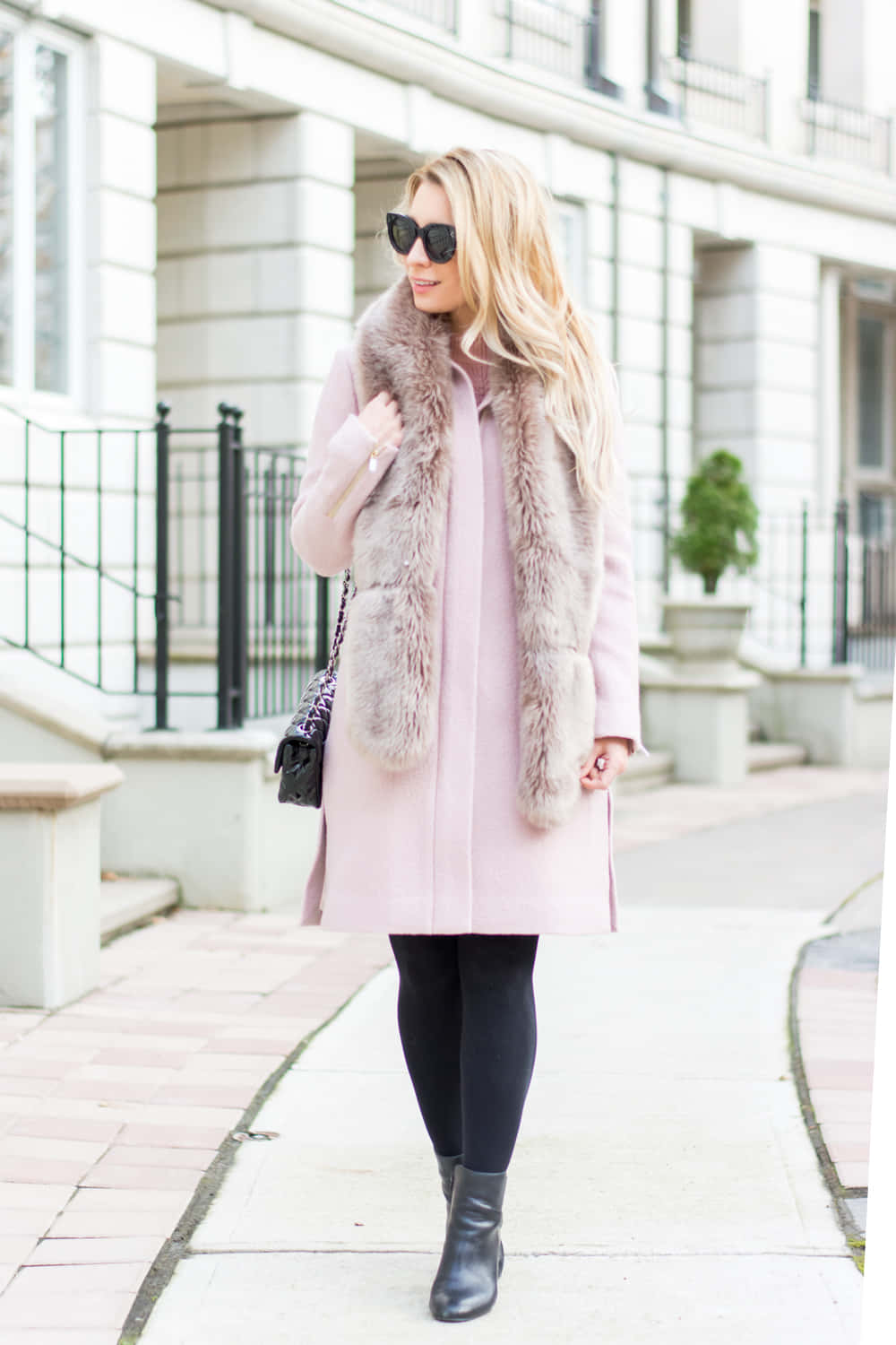 Elegant woman in a stylish pink coat Wallpaper