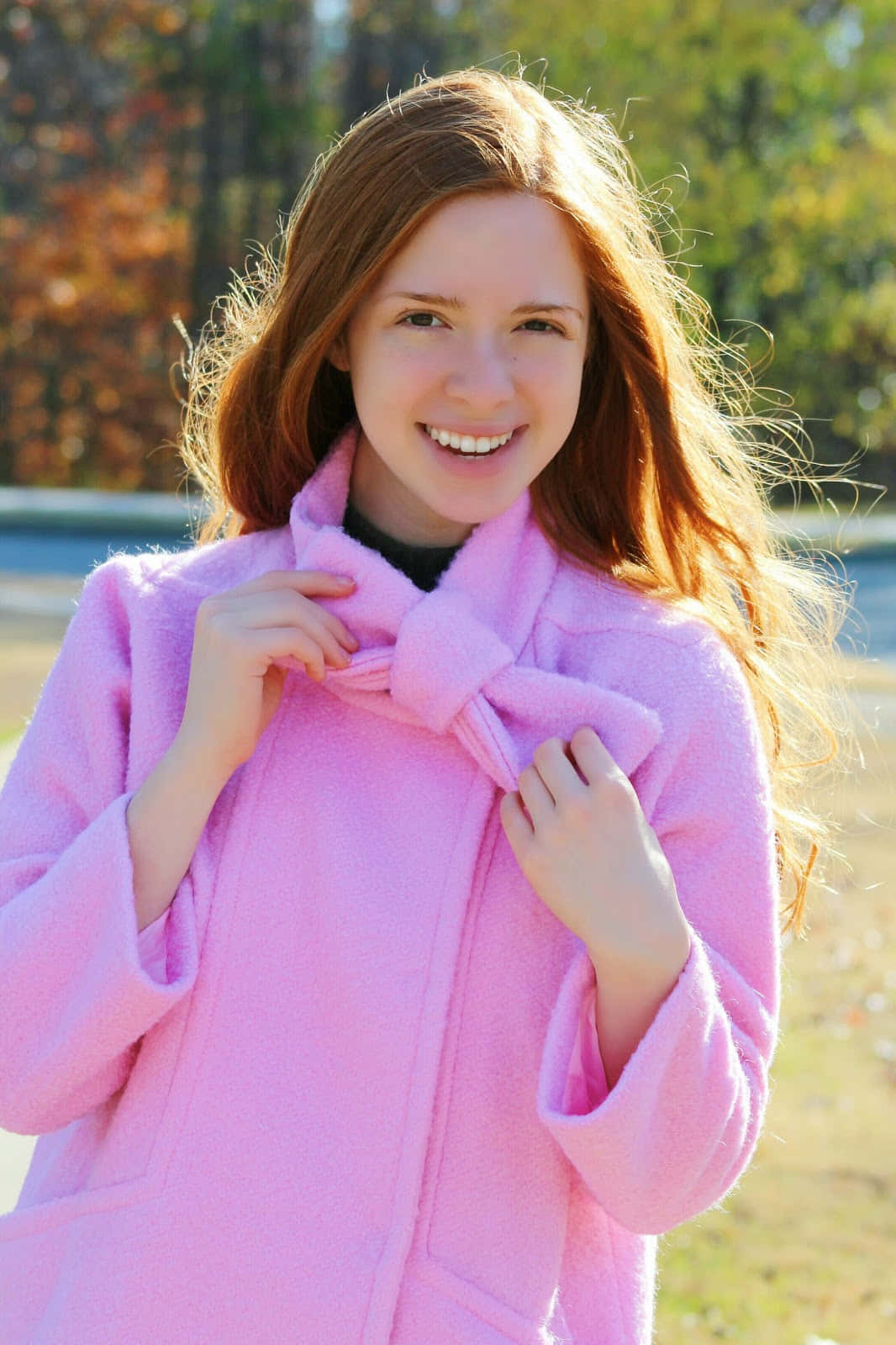 Model in a Stylish Pink Coat Wallpaper