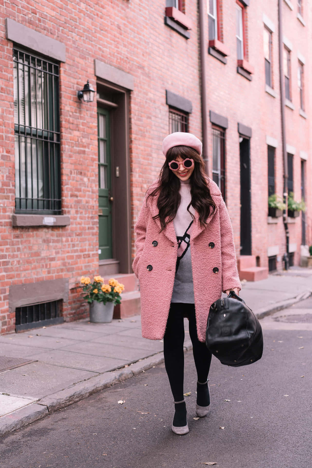 Stylish woman in a vibrant pink coat Wallpaper
