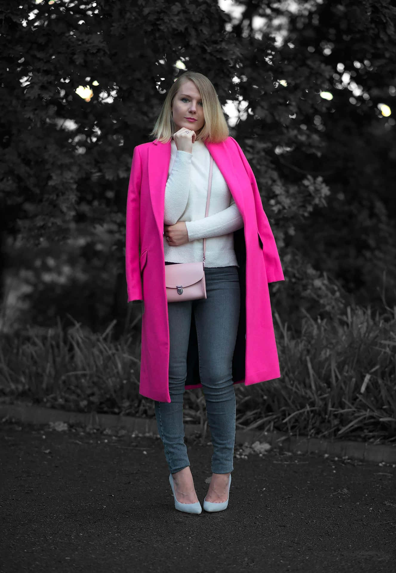 Stylish woman wearing a pink coat Wallpaper