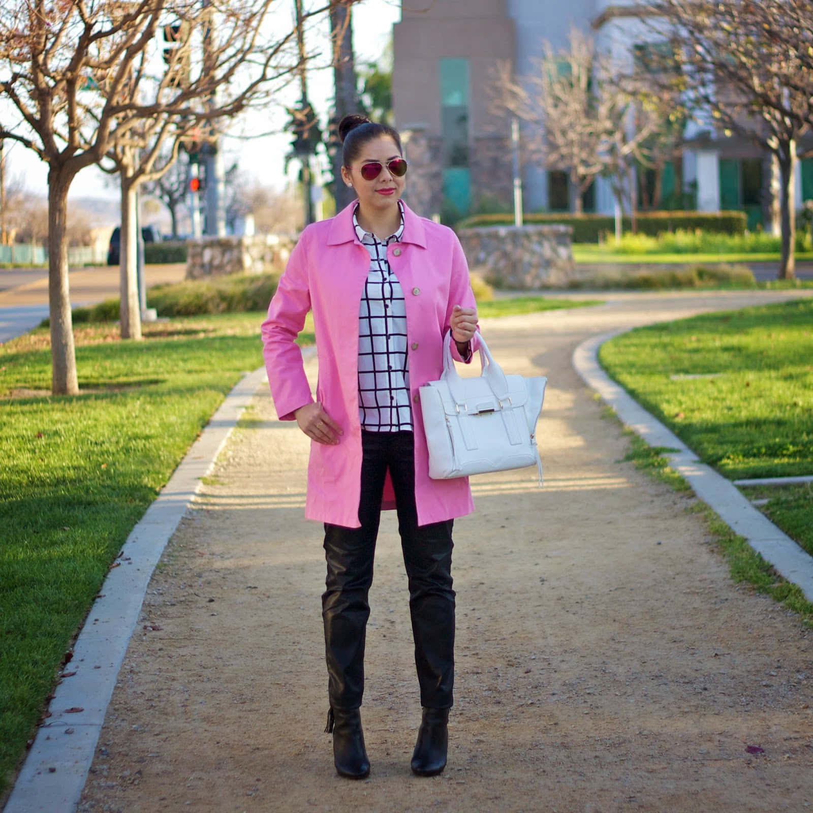 Stylish Woman in a Chic Pink Coat Wallpaper