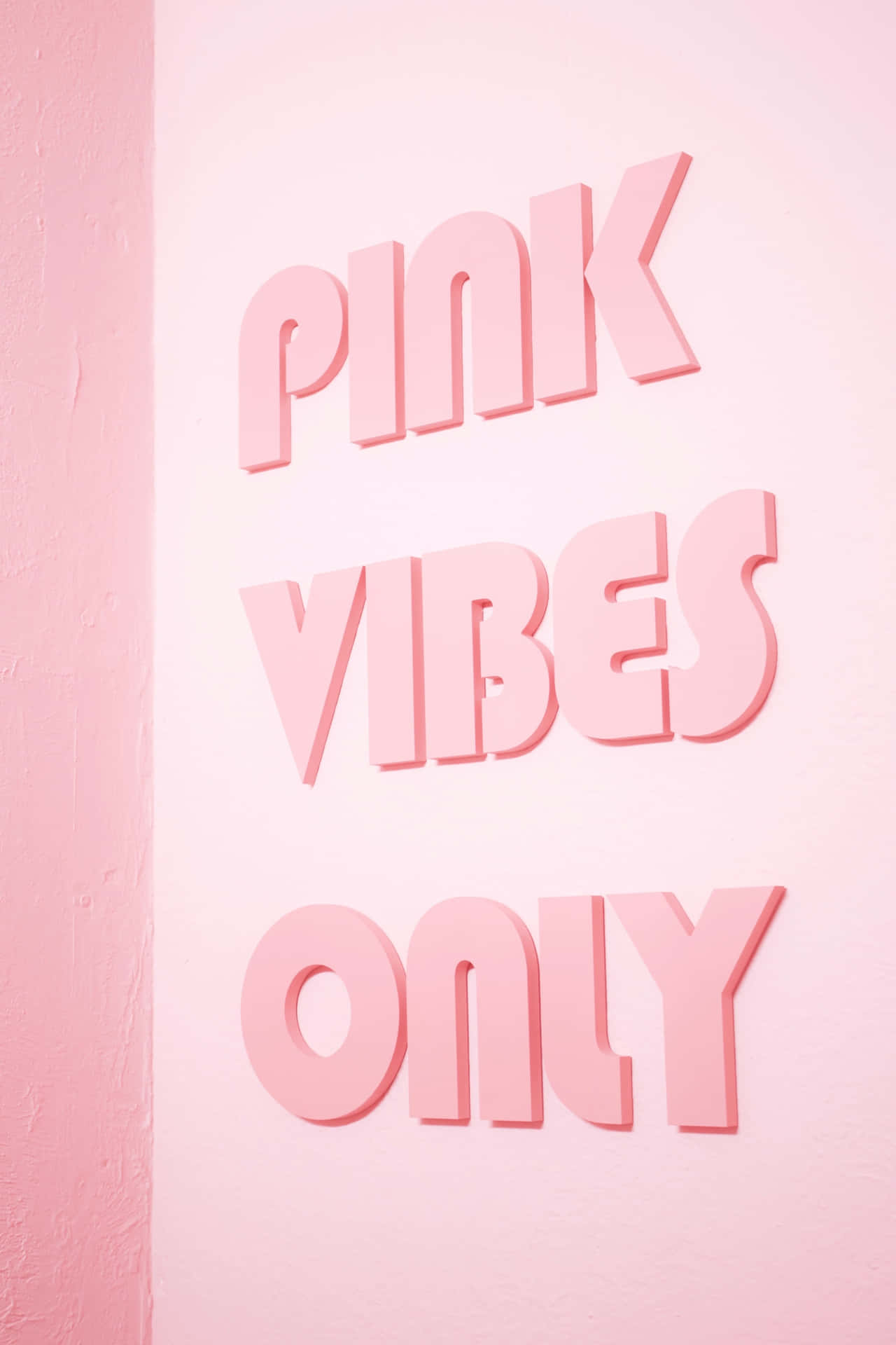 Kun pink vibes - en pink væg med pink bogstaver Wallpaper