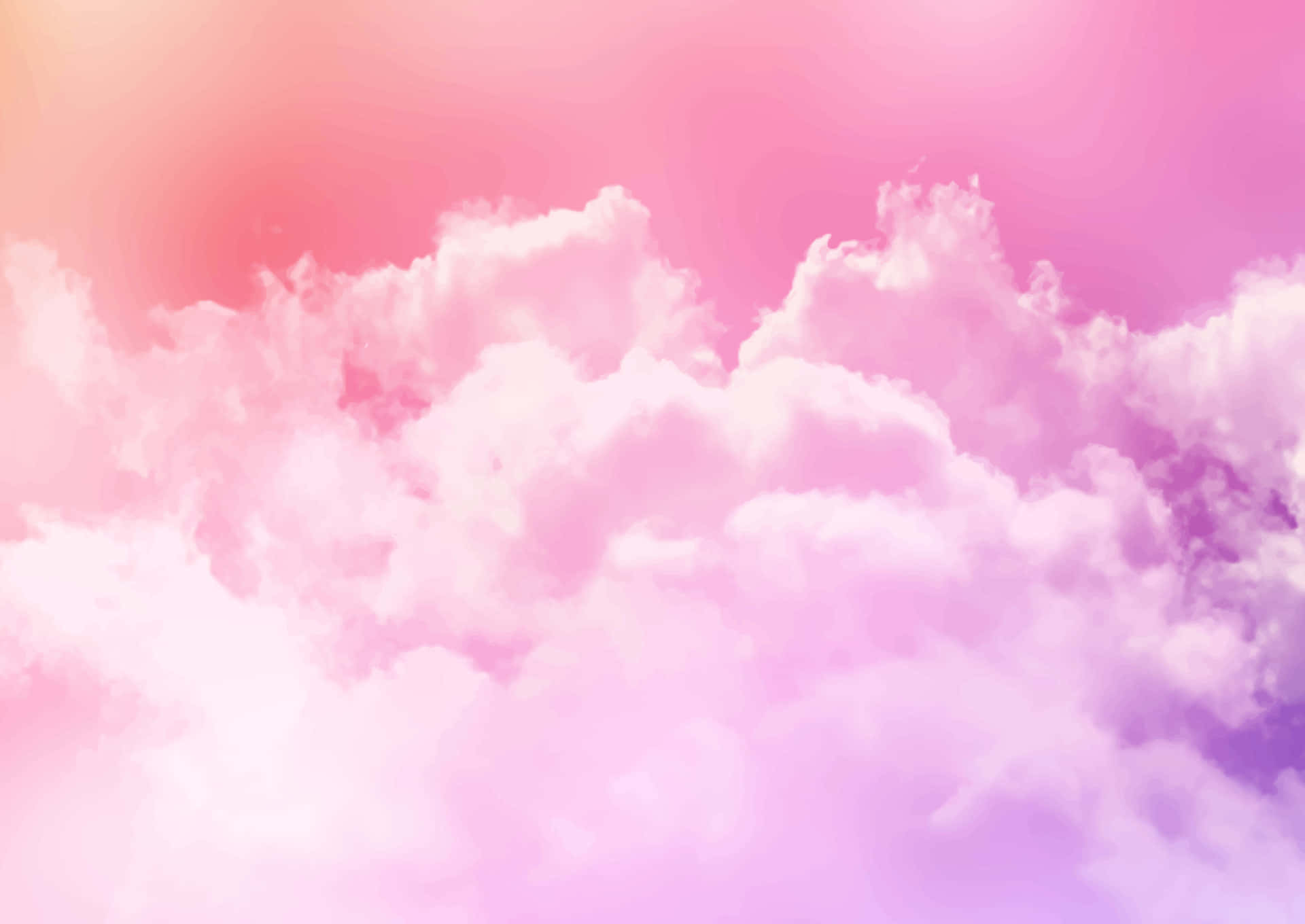 Nubesrosadas Y Moradas En El Cielo Fondo de pantalla