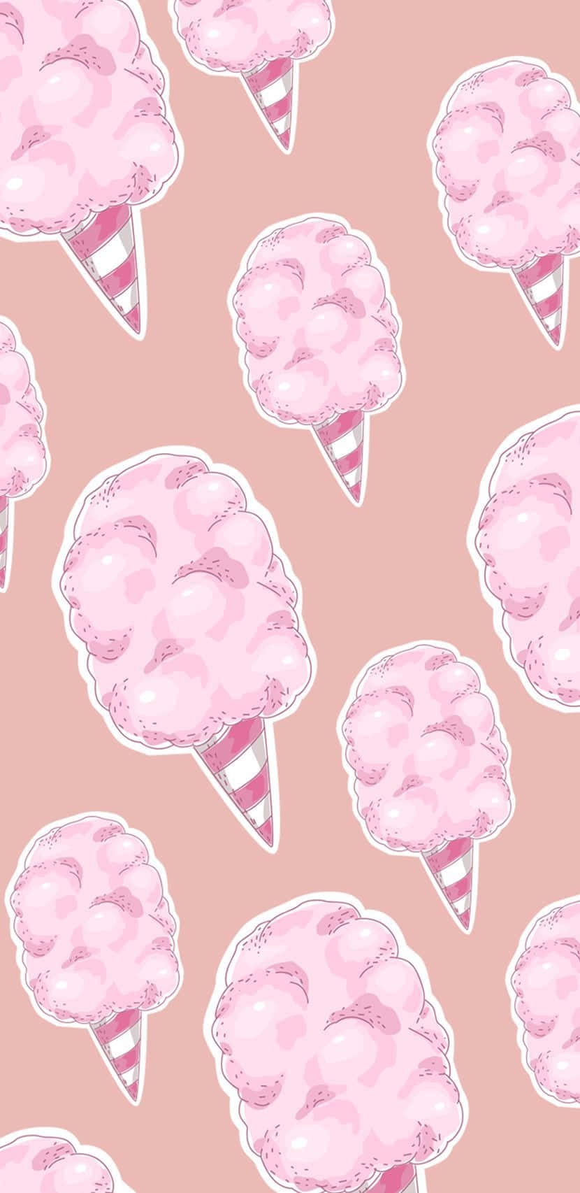 Delight in the Sweet Taste of Delicious Pink Cotton Candy Wallpaper