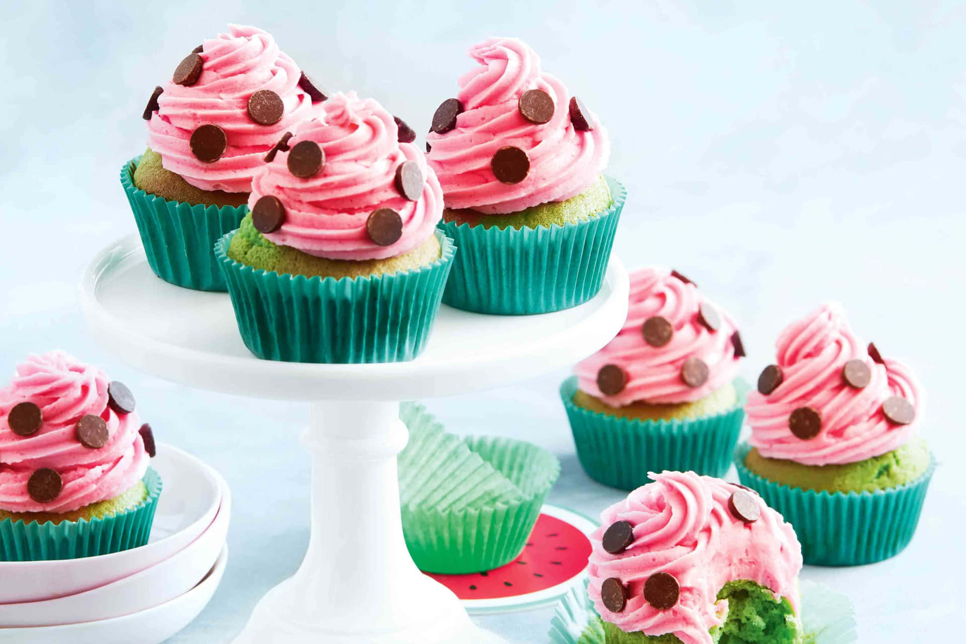 Delicious Pink Cupcakes on a Plate Wallpaper
