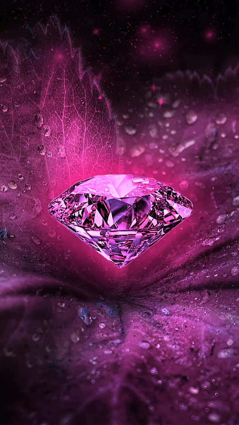 A Pink Diamond Surrounded By Purple Leaves