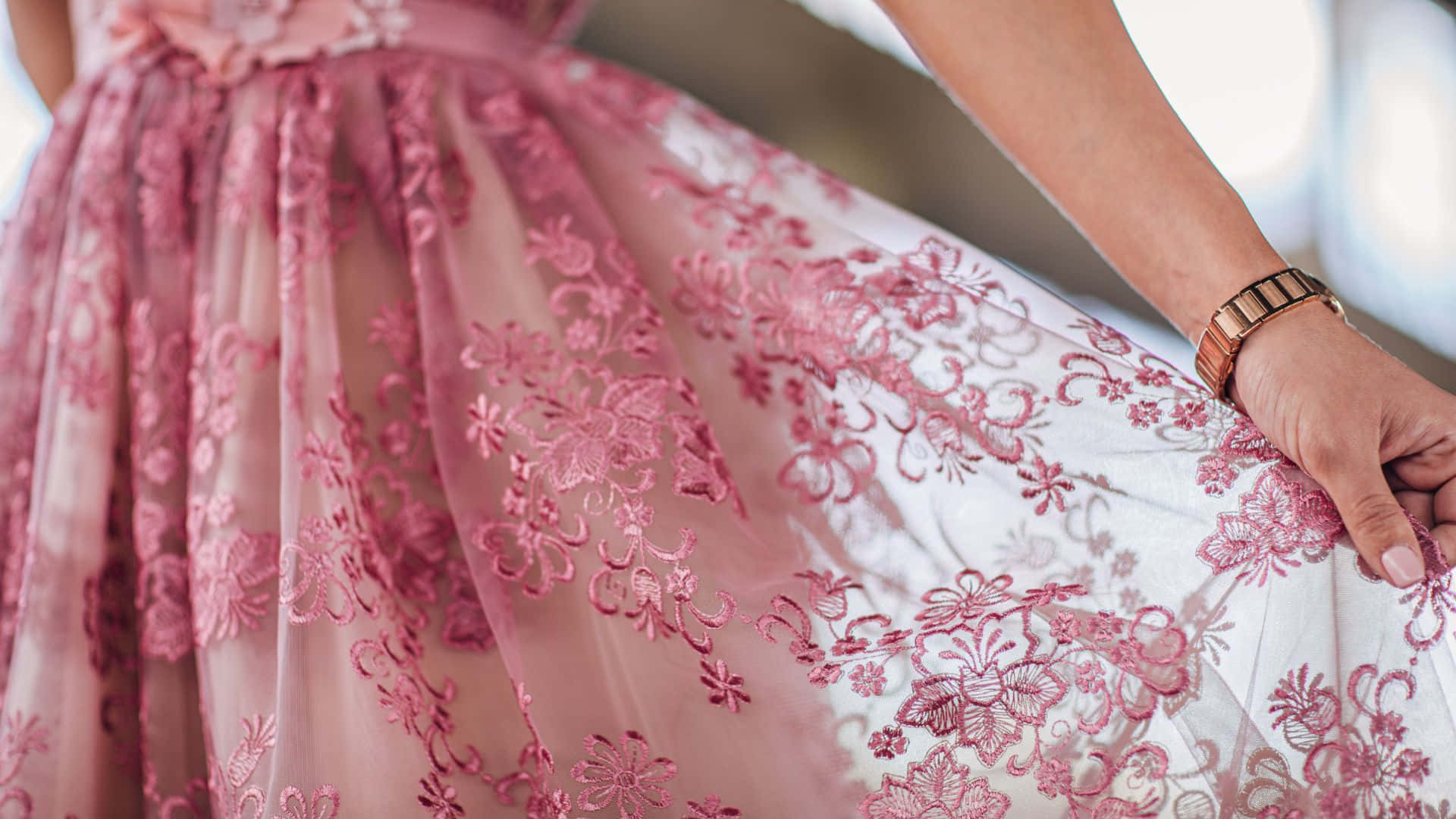 Charming Lady in Elegant Pink Dress Wallpaper