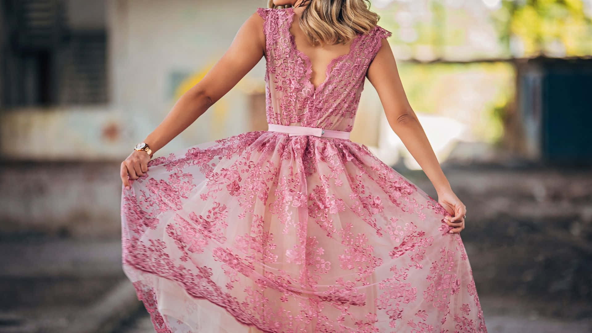 Elegant Woman in Pink Dress Wallpaper