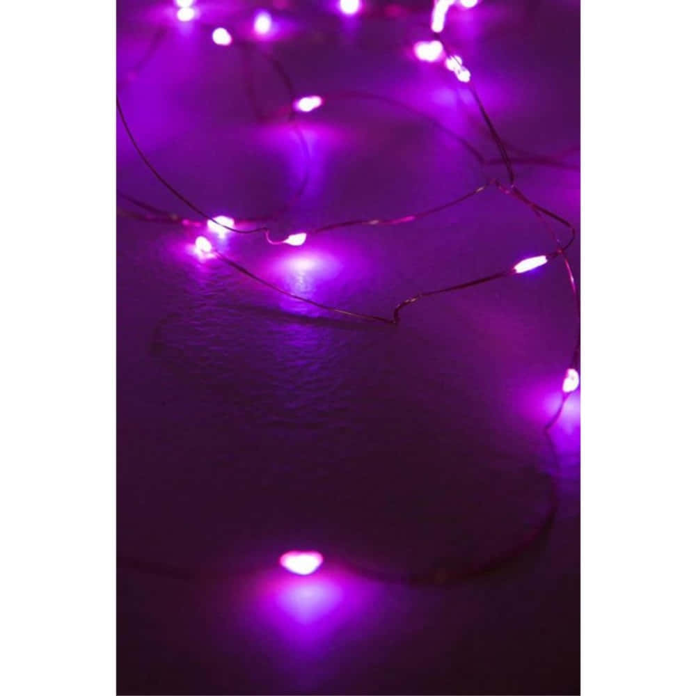 Purple Led Lights On A Dark Surface Wallpaper