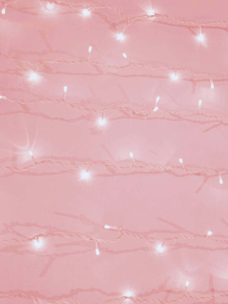 A Pink Background With White Lights On It Wallpaper
