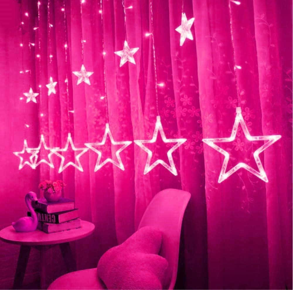 A Pink Room With Stars On The Curtains Wallpaper