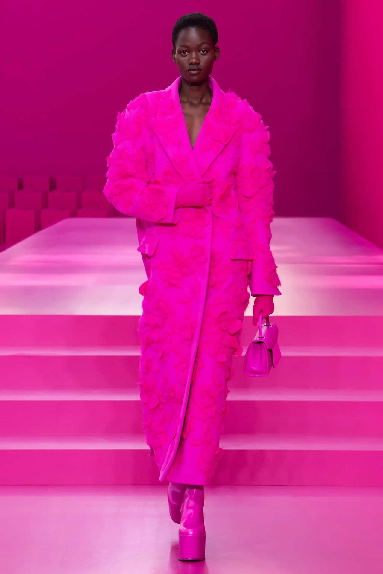 Elegant Woman Posing in Pink High Fashion Outfit Wallpaper