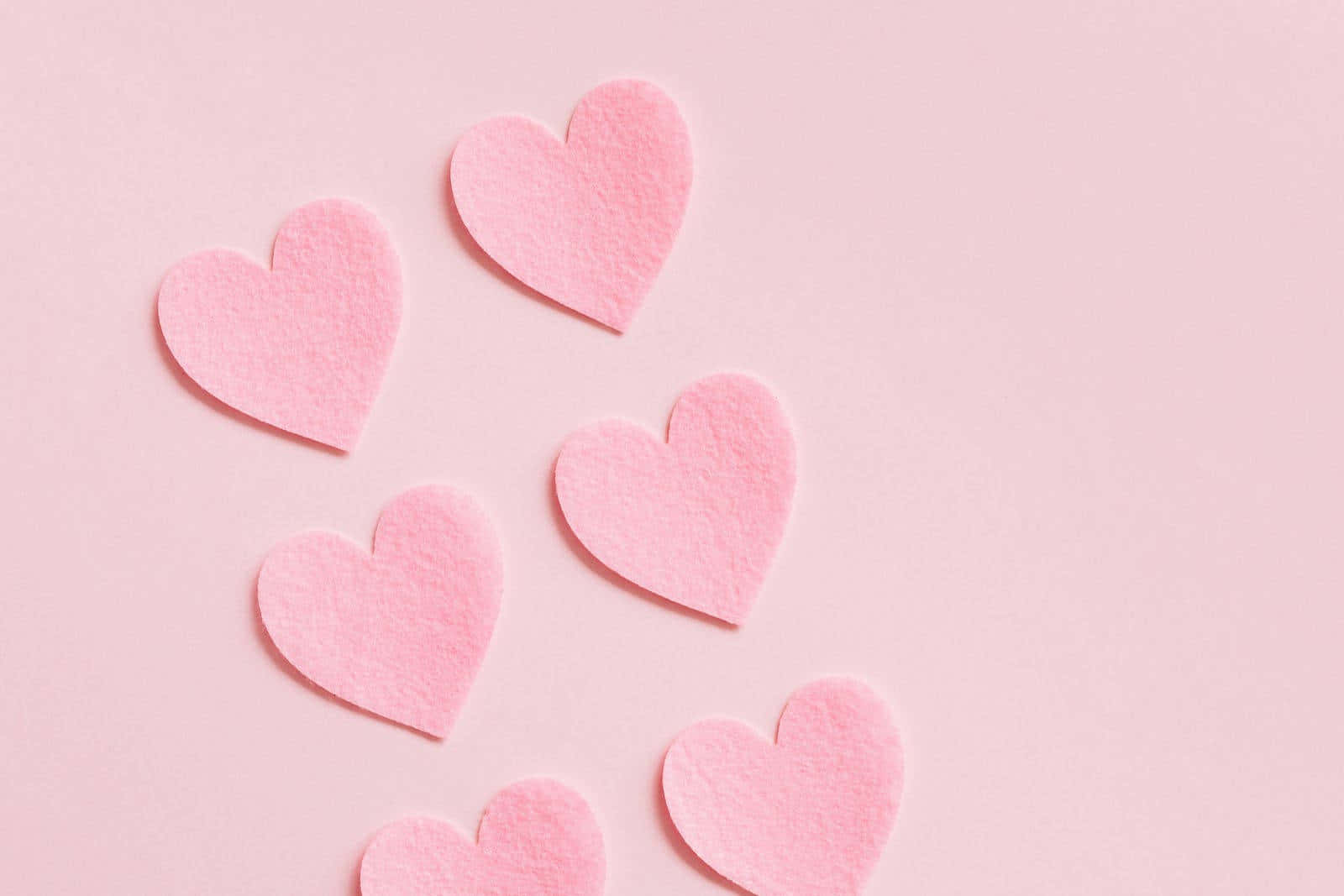 Pink Felt Hearts Background Wallpaper