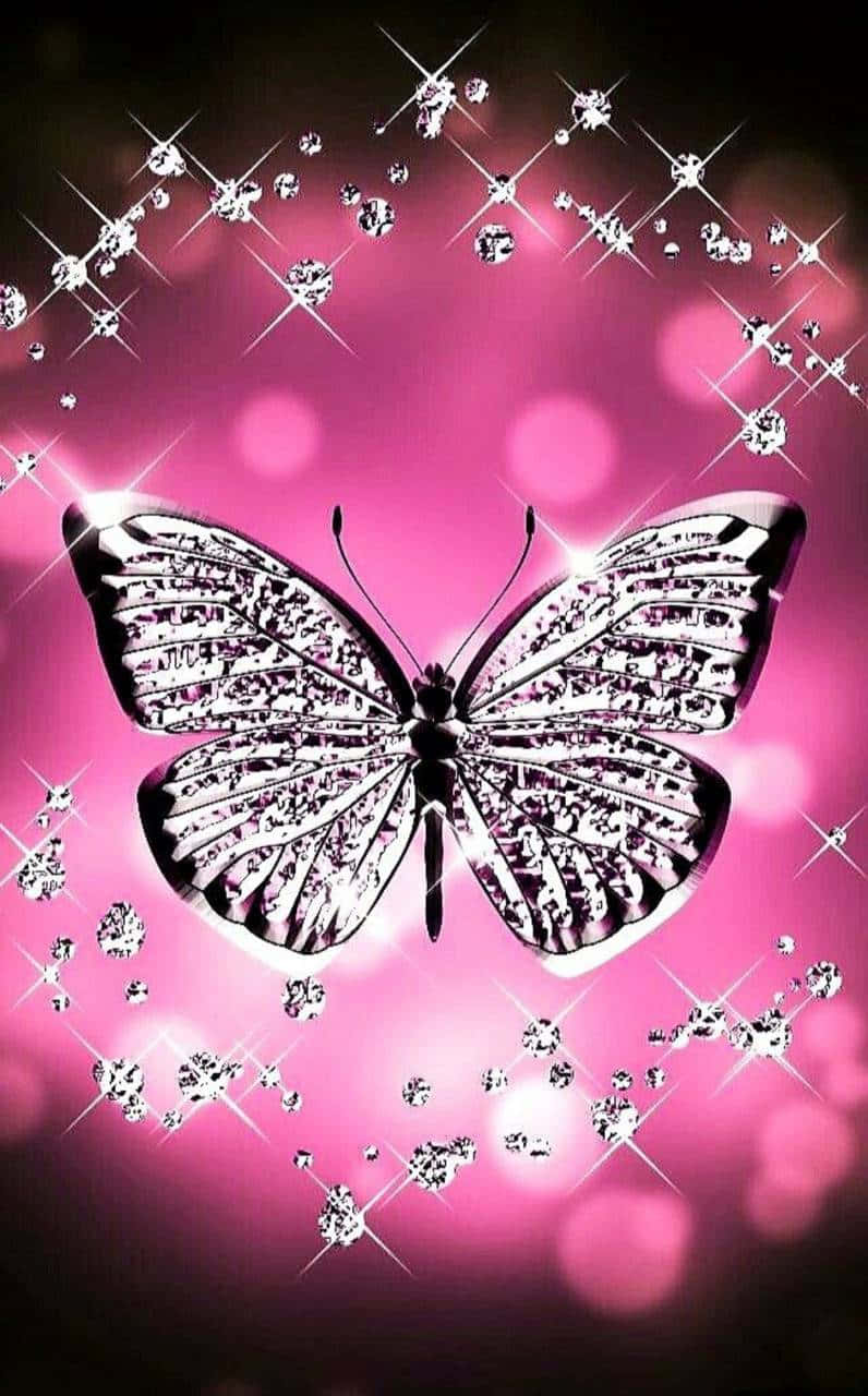 A magical pink glitter butterfly sparkles in the light. Wallpaper