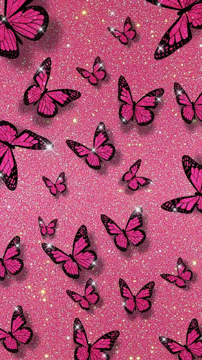 Et pink glimmer sommerfugle sparkler i lyset. Wallpaper