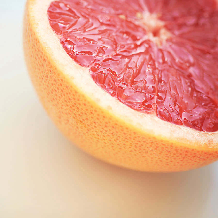 Fresh and Juicy Pink Grapefruit Wallpaper
