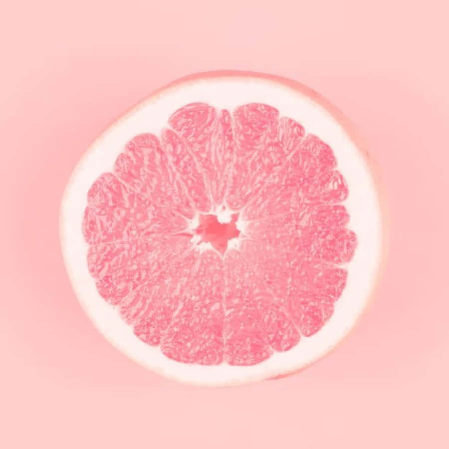 Fresh, Juicy Pink Grapefruit Halves Wallpaper