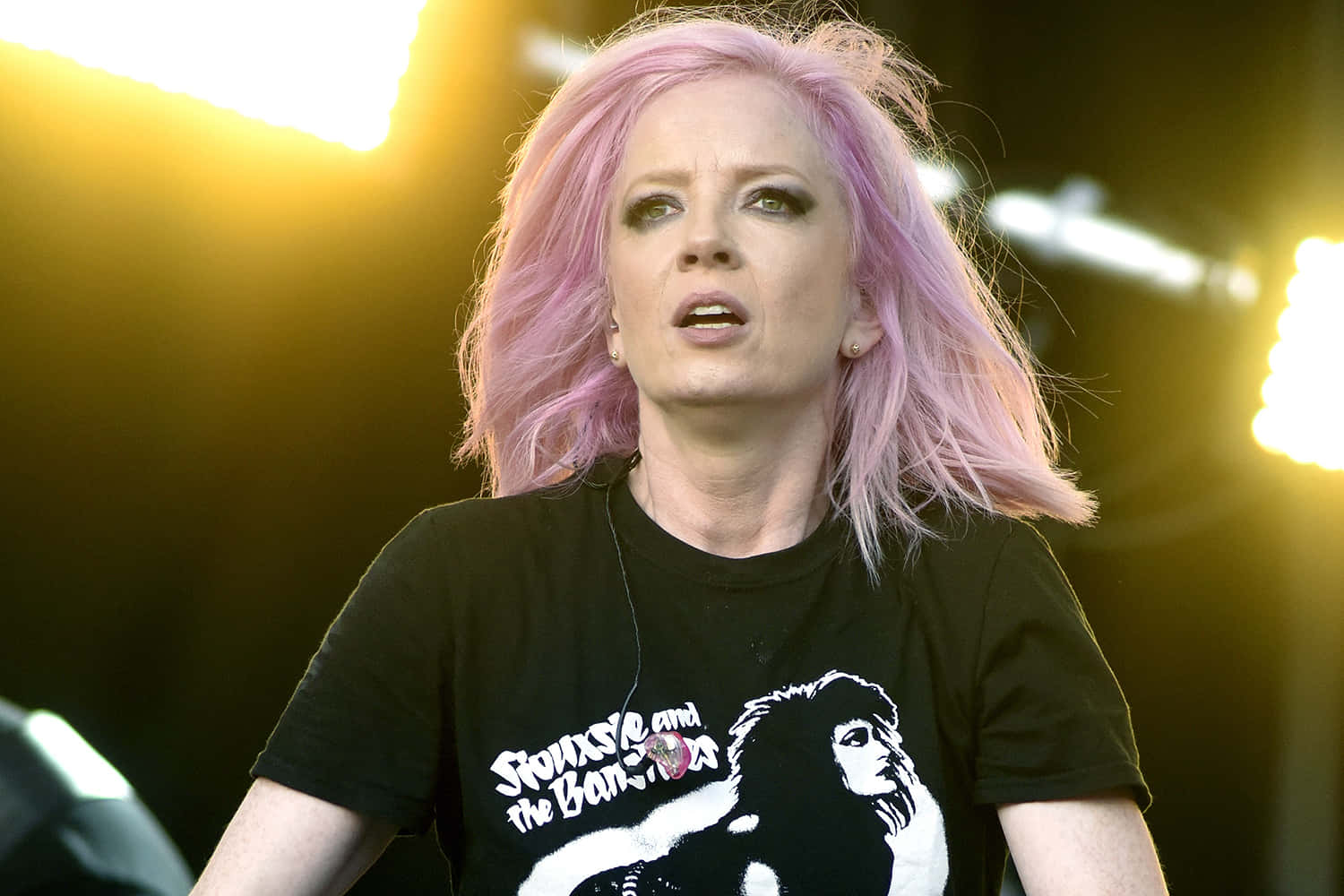 Pink Haired Rock Singer Performance Wallpaper