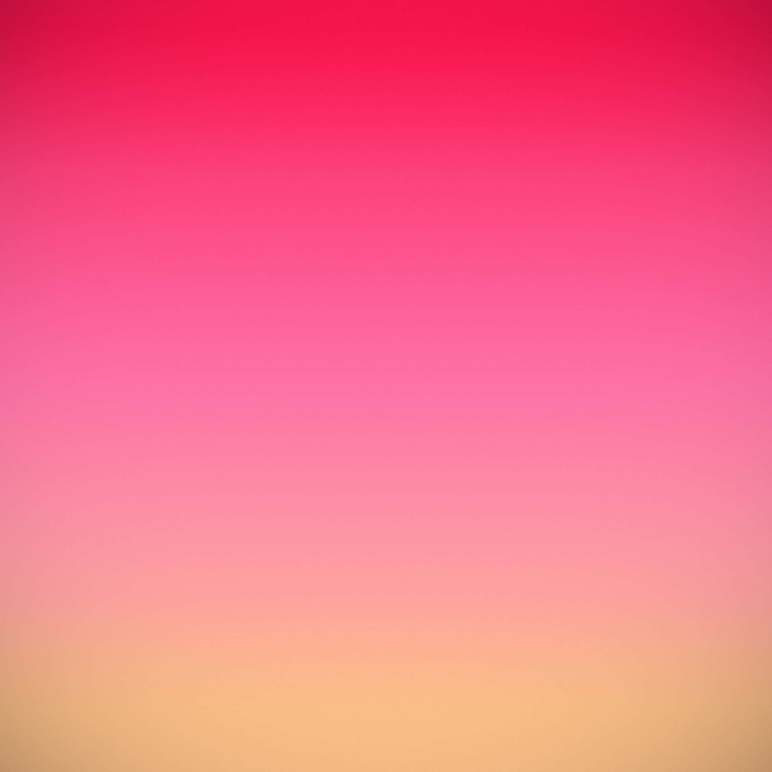 A Pink And Yellow Gradient Background Wallpaper