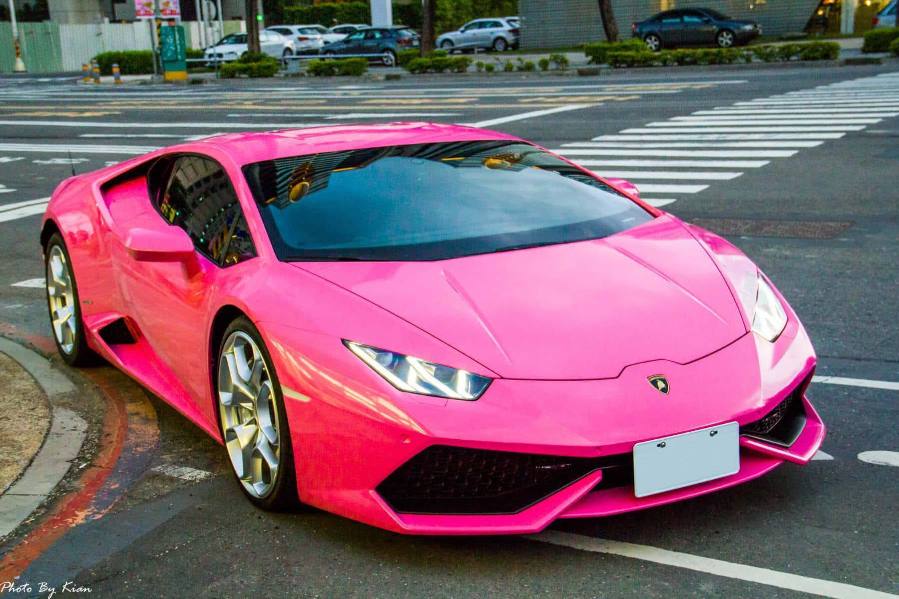 Pink Lamborghini Huracan Urban Setting Wallpaper