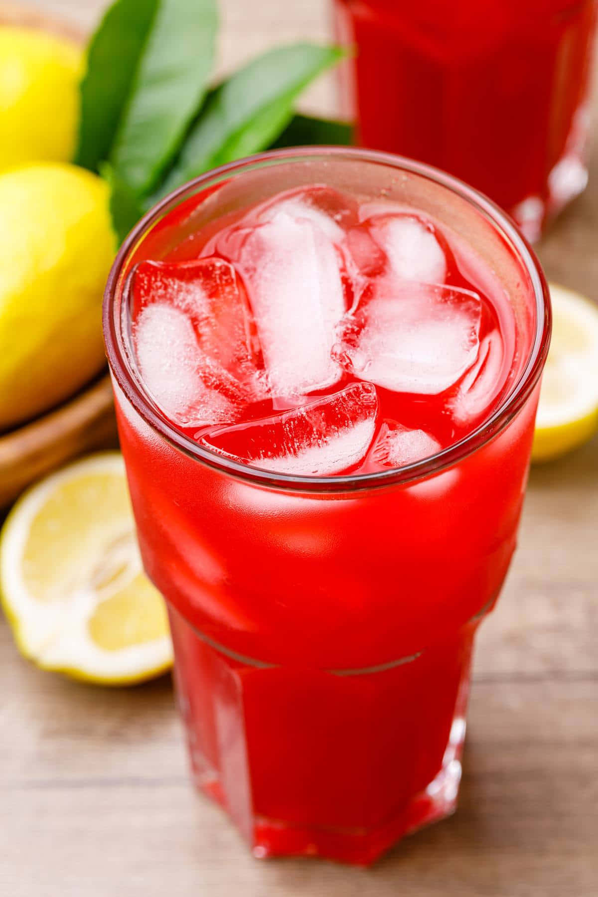 Download Refreshing Glass of Pink Lemonade Wallpaper | Wallpapers.com