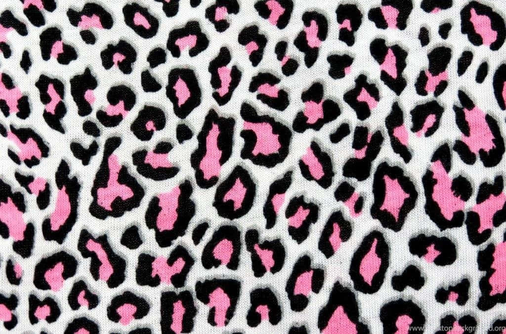 Unleash Your Inner Wild Side with Pink Leopard Print Wallpaper