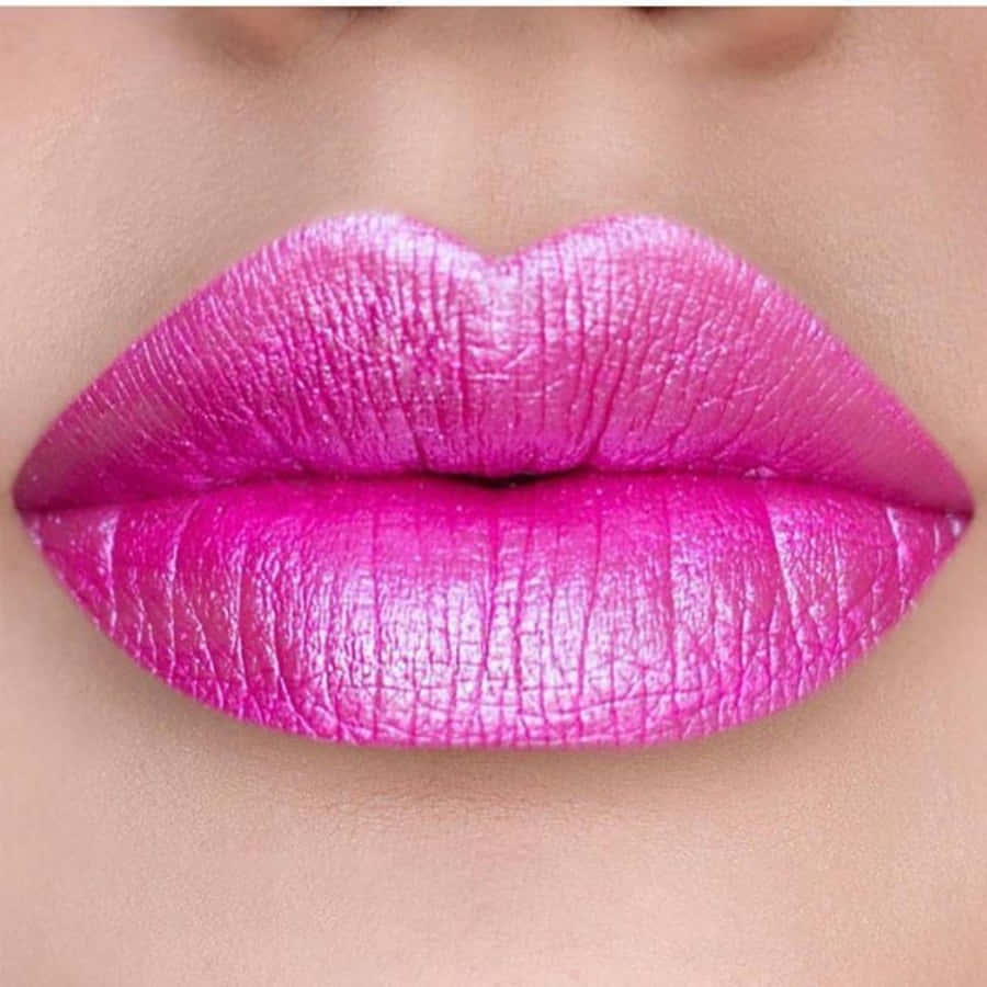 Intense Pink Lipstick on a Sensational Pout Wallpaper