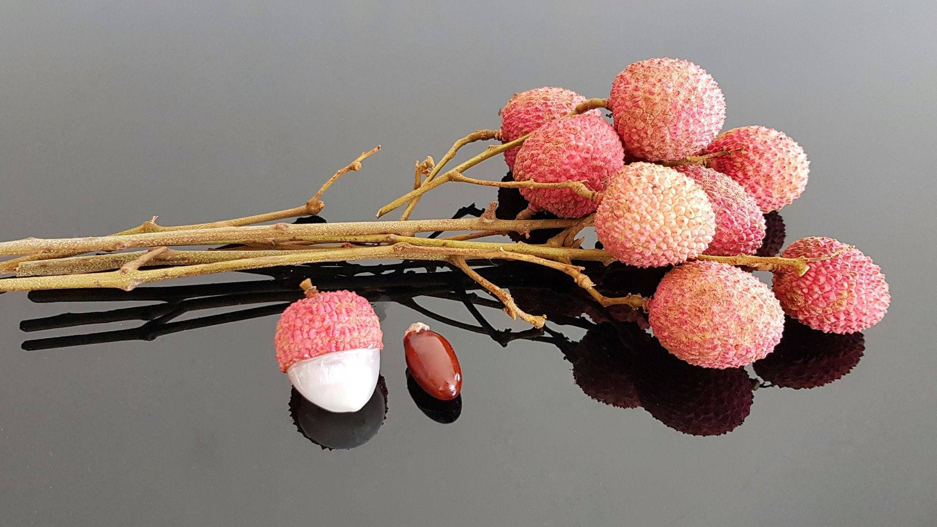 Pink Lychee Fruits Attached To Twigs Wallpaper