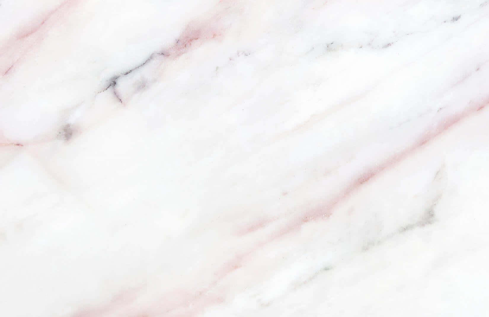 A Close Up Of A Pink Marble Background