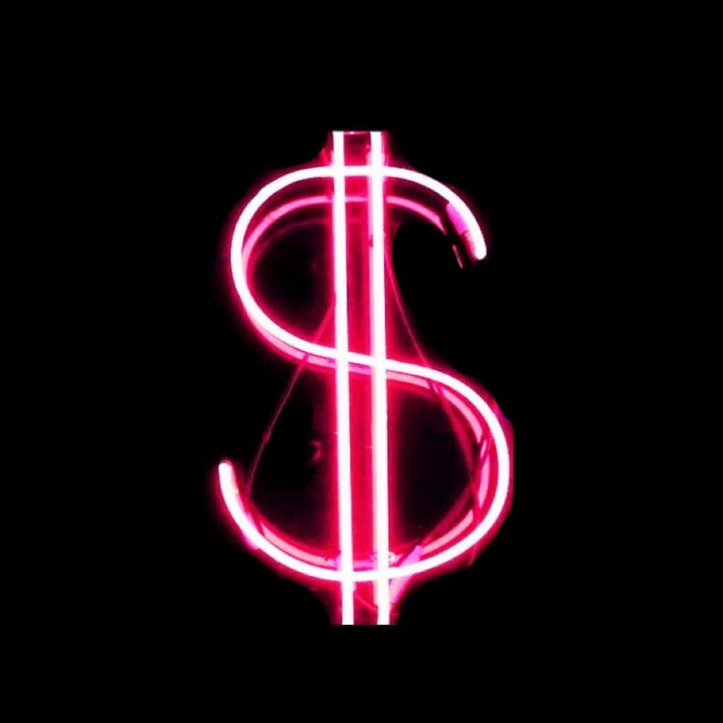 Unsímbolo De Dólar Rosa Está Iluminado Sobre Un Fondo Negro. Fondo de pantalla