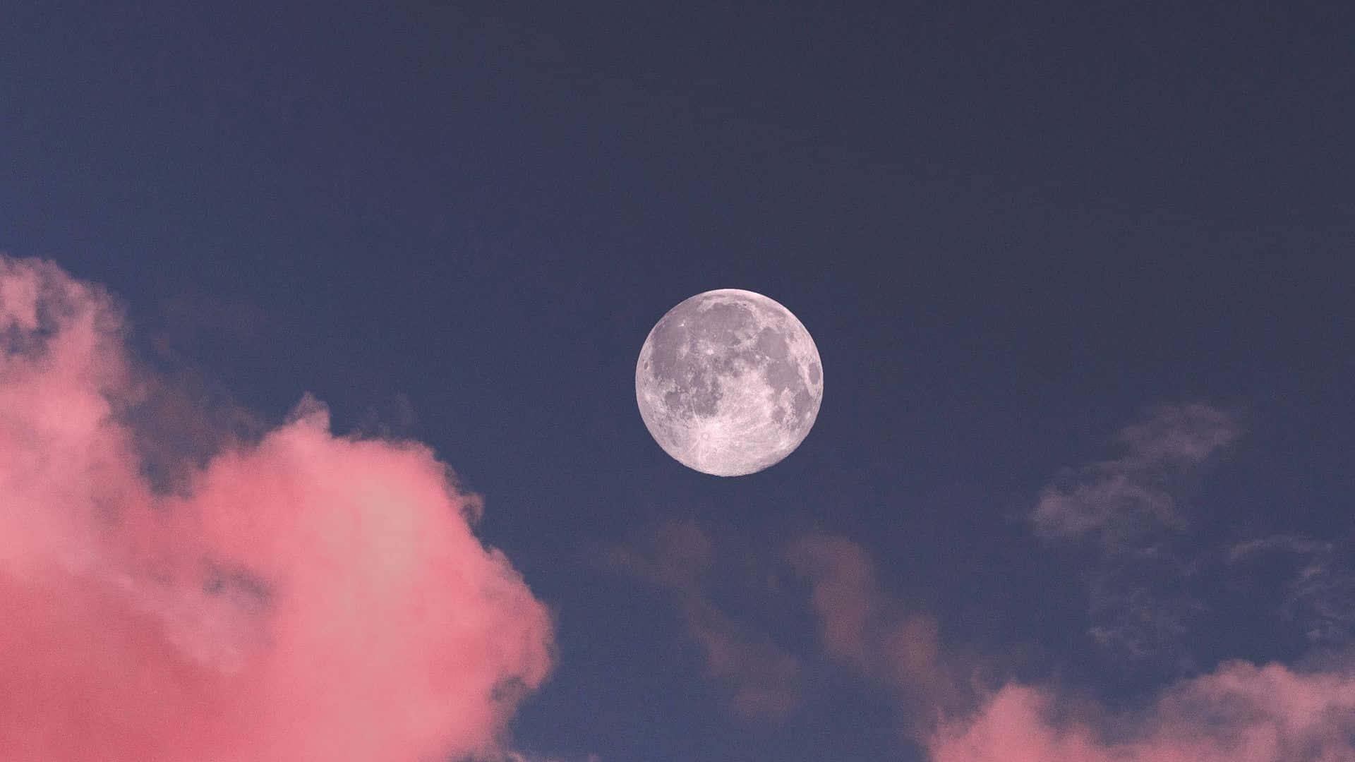 Pink Moon Illuminating Night Sky Wallpaper