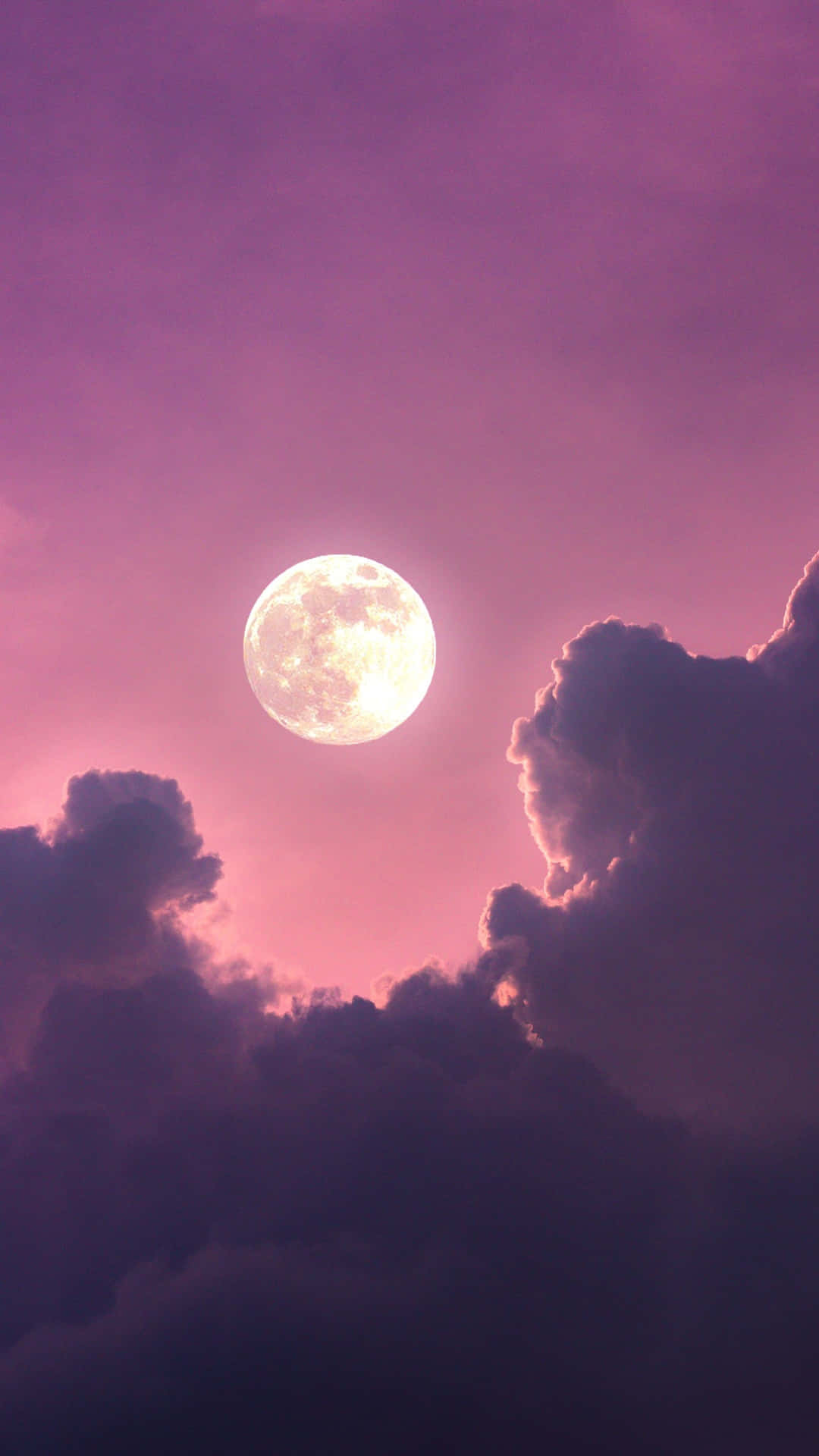Glødende pink måne og skyer Wallpaper