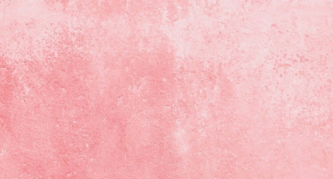 A pink pastel background creates a dreamy, soothing atmosphere