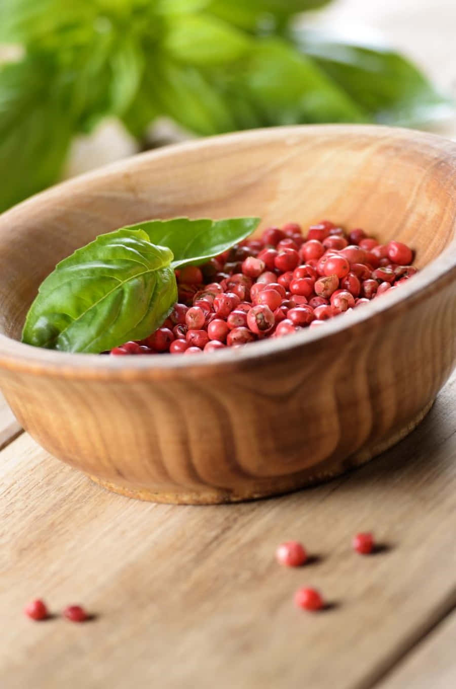 Pink Peppercorns on a Wooden Spoon Wallpaper