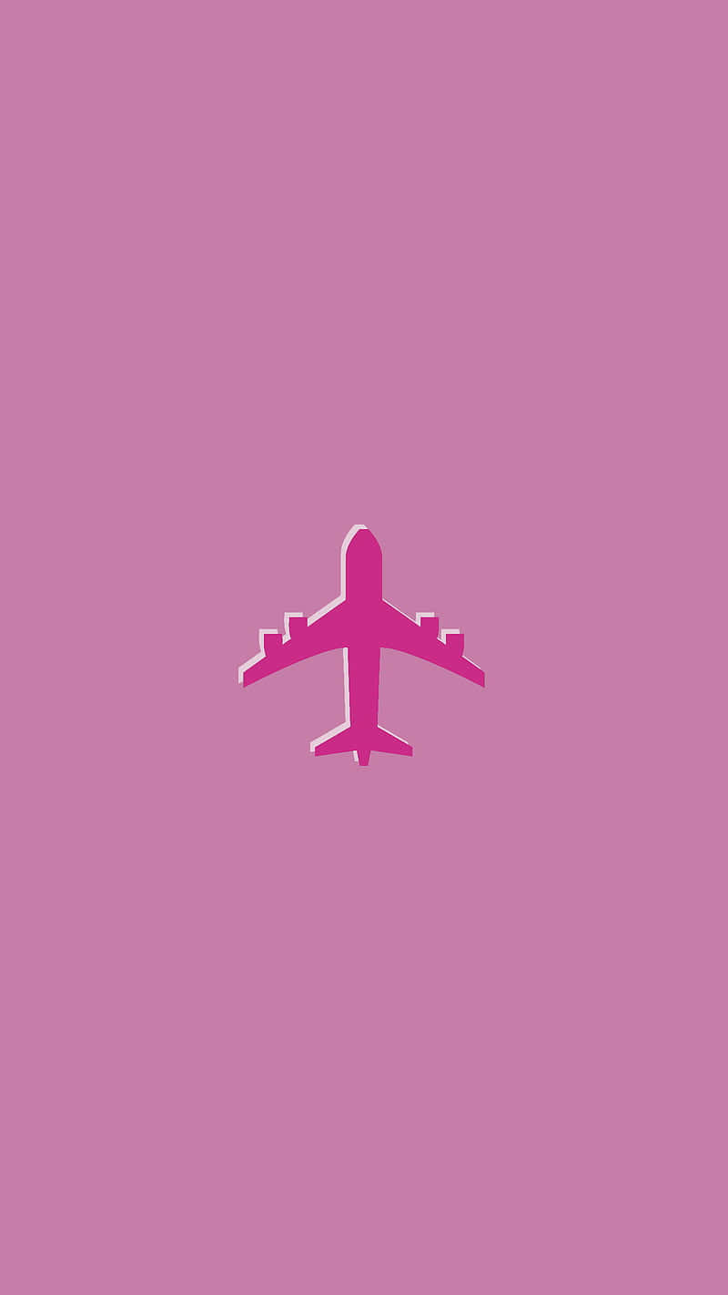 Vuelahacia La Puesta De Sol En Un Hermoso Avión Rosa. Fondo de pantalla