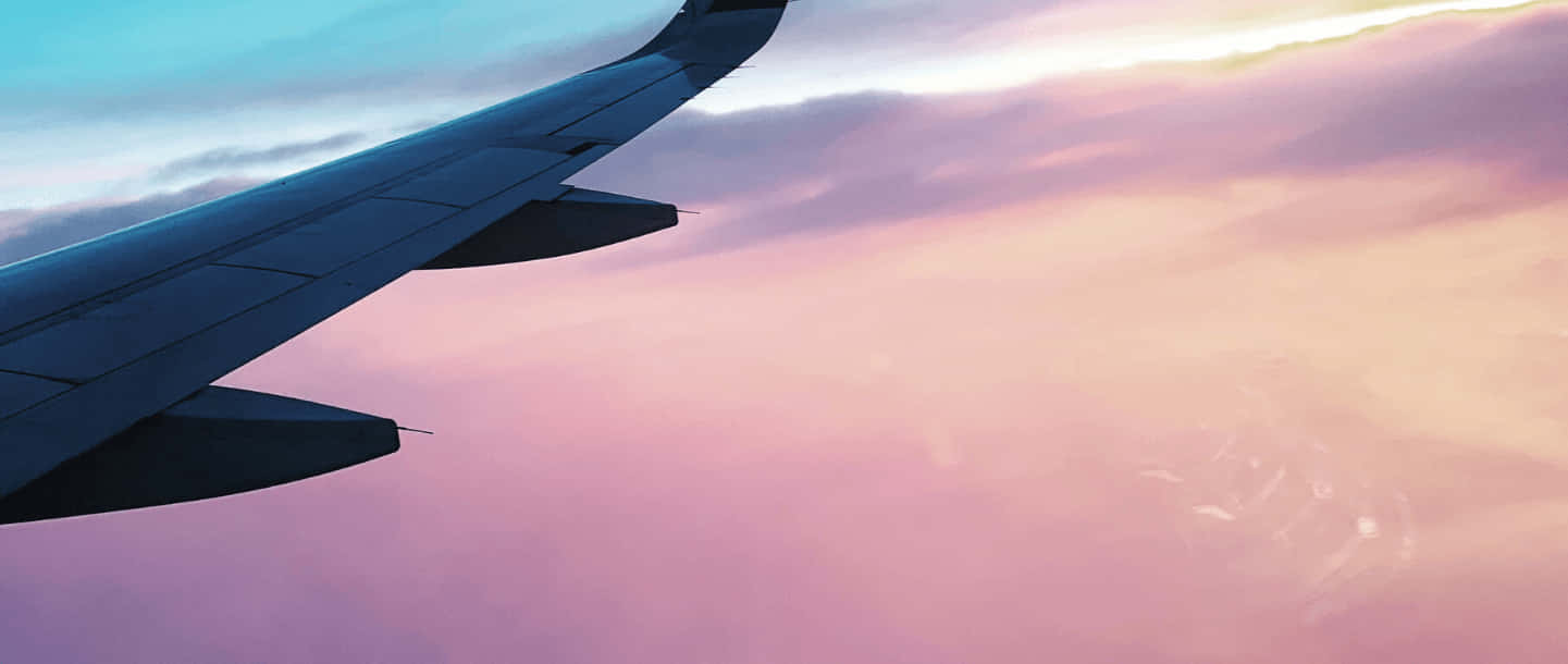 Bewunderungfür Ein Leuchtend Pinkfarbenes Flugzeug Wallpaper