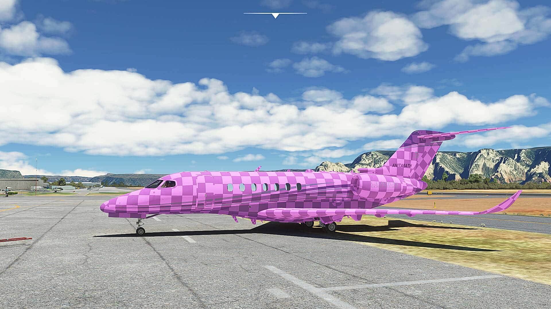Fly Pink - A Gorgeous Plane Propelling Through The Skies Wallpaper