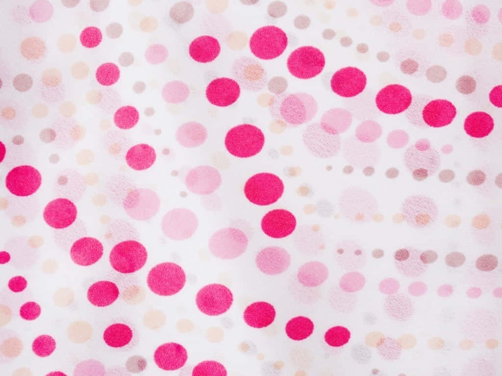 "Cute and vibrant pink polka dot background to brighten your days!"