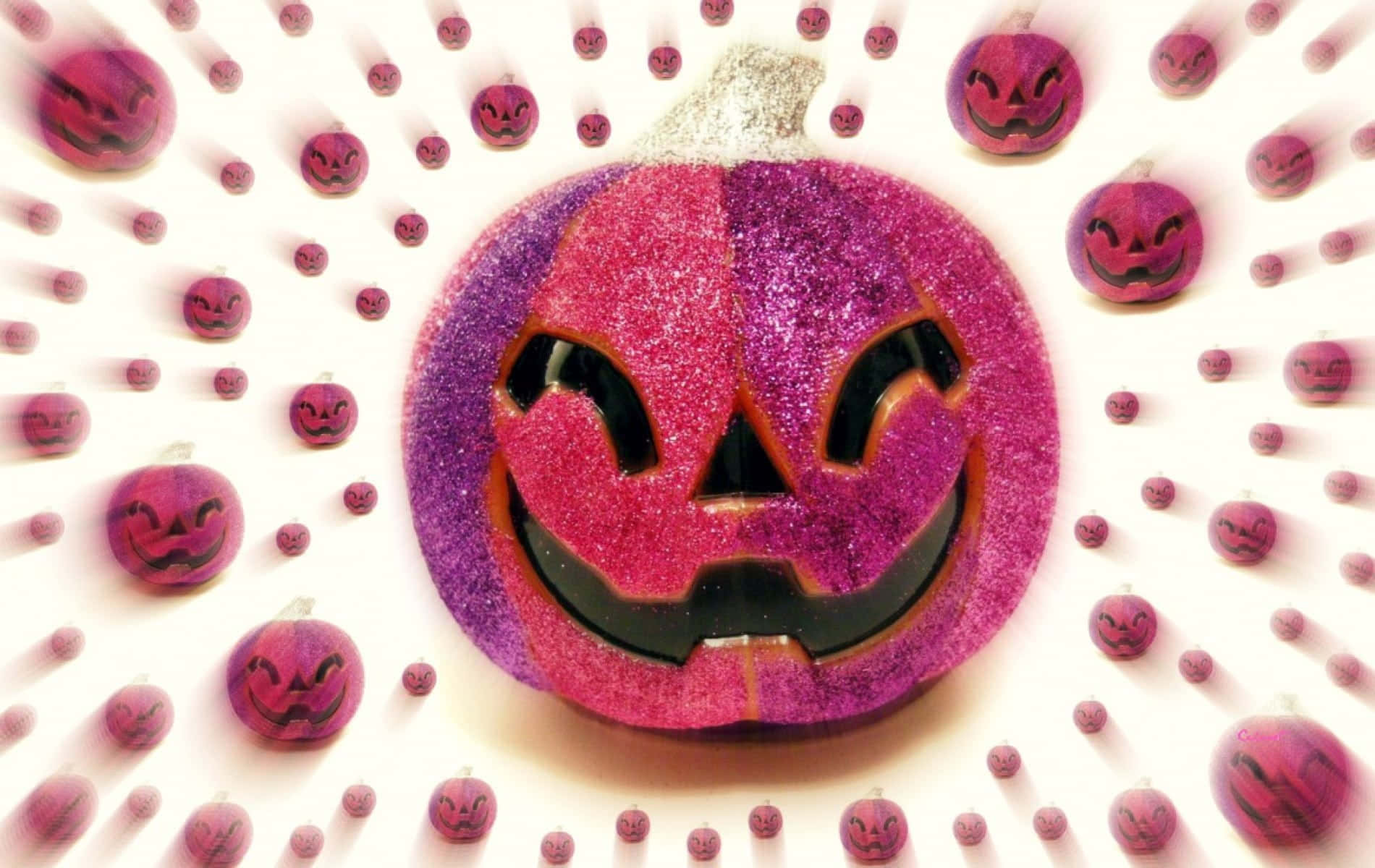 A beautifully pink pumpkin smiling at you! Wallpaper