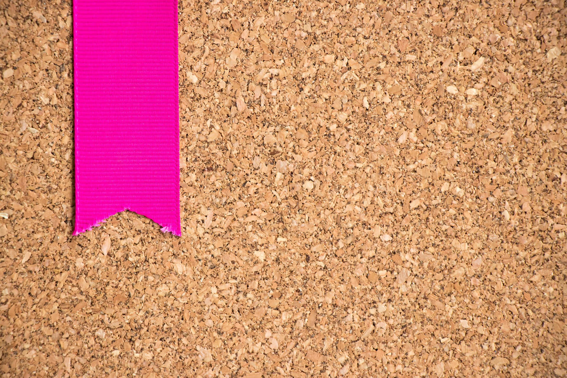 Pink Ribbonon Cork Board Texture Wallpaper